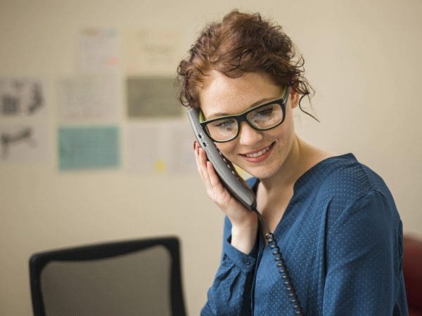 Medical-Receptionist-On-The-Phone